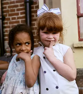 Two little girls on a Balham street, SW London