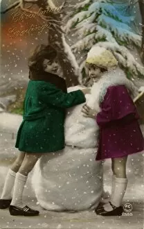 Images Dated 30th January 2012: Two little girls on Christmas Greetings postcard