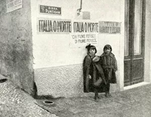 Two little girls and posters, Fiume, Free State of Fiume