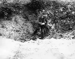 Lloyd George in shell hole, Fricourt, France, WW1