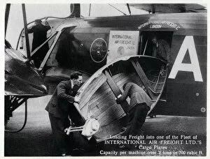 Cargo Gallery: Loading freight into one of the Fleet of International Air Freight Ltd.s Cargo Planes - capacity
