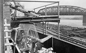 Steelworks Prints: Loading pig iron into railroad cars at steelworks
