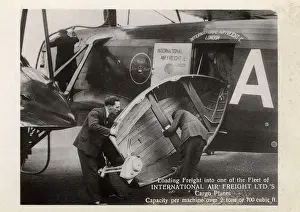 Freight Prints: Loading a small boat into a Cargo Plane