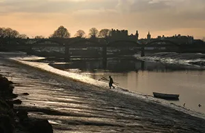 Images Dated 27th August 2019: Lobster fisherman leaves boat and climbs bank of River Dee