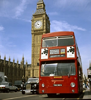 london bus and taxi next to Housed of Parliament and Big Ben