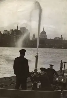Hosepipe Prints: London Fire Brigade firemen on a fireboat, River Thames