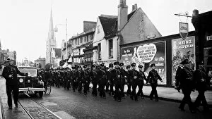 London firefighters marching in SE London street, WW2