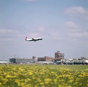 Daisies Prints: London Heathrow Airport - View out over the runways with plane taking off