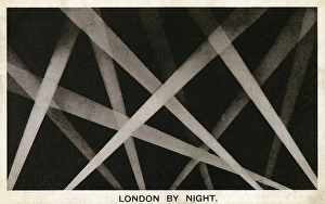 London by Night - Searchlights crossing the night sky