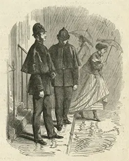 London policemen wearing rain capes
