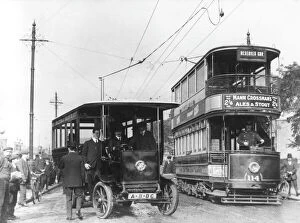 A London tram overtaking a trolleybus