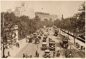 Looking East from Hungerford Bridge, on the left is Embankment Underground Station. Date: 1935