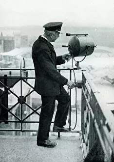 Images Dated 30th June 2021: Lookout man operating signalling lamp, Croydon Airport