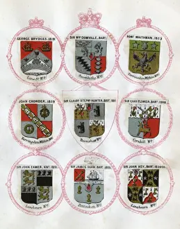 Loose page from a scrapbook of crests and heraldry