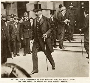 Kitchener Gallery: Lord Kitchener walking down steps alone of War Office. His first public appearance as
