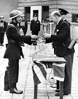 Waterproofs Prints: Lord Mayor of London presenting a cup, WW2