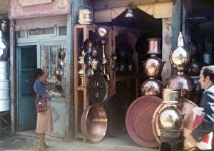 Images Dated 25th July 2016: Lorna Holder photographing the front of a Egyptian novelty s