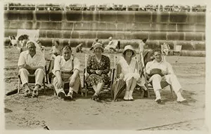Images Dated 20th April 2020: A lovely group photo of five friends (or relatives) sitting on deckchairs on the beach at