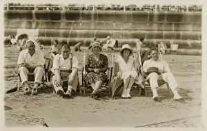 Images Dated 20th April 2020: A lovely group photo of five friends (or relatives) sitting on deckchairs on the beach at