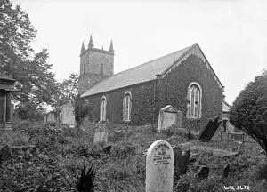A low view of a Church from the graveyard