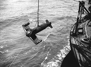 Under Water Prints: Lowering a paravane on entering a minefield, WW1