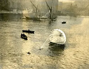 Demonstrate Prints: Lt Col Orde Lees being dragged through the water after d?