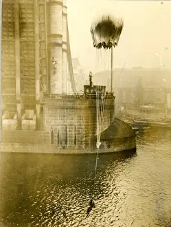 Demonstrate Prints: Lt Col Orde Lees about to hit the water after diving hea?