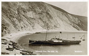 Images Dated 1st March 2019: Lulworth Cove, The Cliff - A paddlesteamer moored up