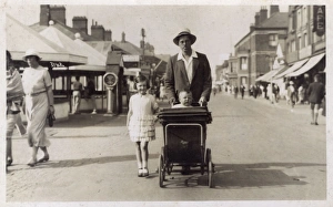 Elder Gallery: Mablethorpe, Lincolnshire - Gent pushing his young baby