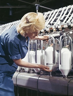 Precision Gallery: A Machine Collects Woollen Thread on spools