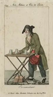 Magician performing the cup and balls trick