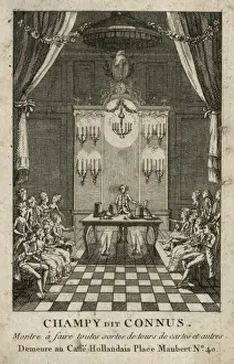 Magician performing the cup and balls trick in front of a se