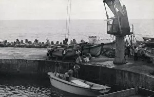 Crane Collection: Mail arriving by boat in Calshot Harbour, Tristan de Cunha