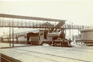 Coupled Prints: Mail train under steam