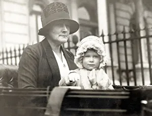 Images Dated 8th February 2021: Her Majesty Queen Elizabeth II as baby in pram with nanny
