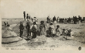 Images Dated 24th March 2016: Malo-les-Bains, France - children building sandcastles