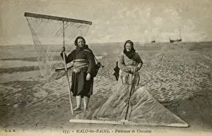 Malo-les-Bains, France - women fishing for shrimp