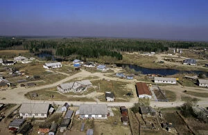 Aerials Gallery: Maloyuganskii village - aerial of village and taiga forest