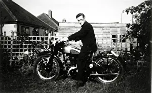 Man on a 1951 BSA Gold Star motorcycle