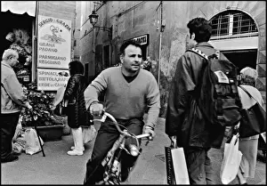 Man on bike, Pisa, Italy
