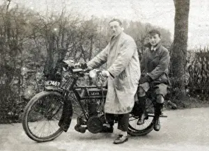 Man & boy on a 1914 Levis motorcycle