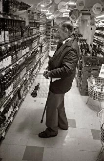Oneill Gallery: A man buys wine in the Eccles Morrisons store