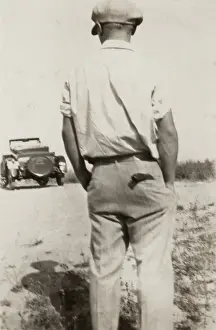 Man and his car (in distance)