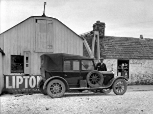 Northernmost Gallery: Man and car outside Post Office, John o Groats, Scotland