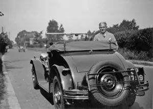 Man and car on road to Brighton, Sussex