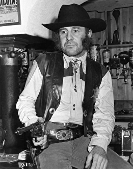 Images Dated 7th November 2016: Man in cowboy outfit, Hayle, Cornwall