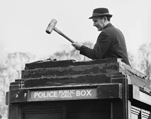 Man demolishing top of police public call box