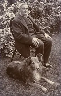 Man with a dog in a garden