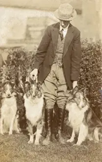 Tweedy Prints: Man with three dogs in a garden