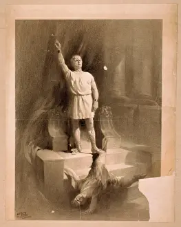 Man dresses as Roman with raised arm standing on steps above